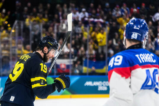 Adrian Kempe of Sweden celebrates 2-1 in the men's ice