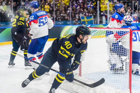 Elias Pettersson of Sweden celebrates scoring 4-2 in the