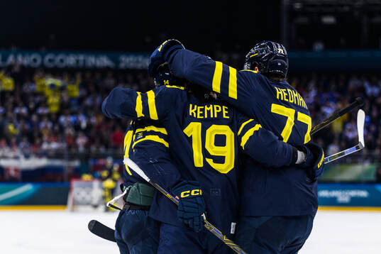 Joel Eriksson Ek, Adrian Kempe and Victor Hedman of Sweden