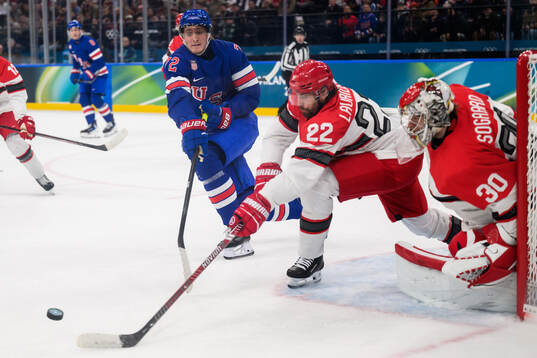 Tage Thompson of USA against Markus Lauridsen and
