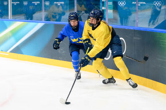 Lisa Johansson and Josefin Bouveng of Sweden at an ice