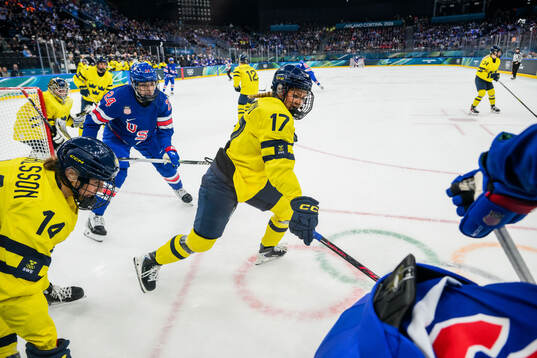 Joy Dunne of USA and Sofie Lundin and Ida Karlsson of