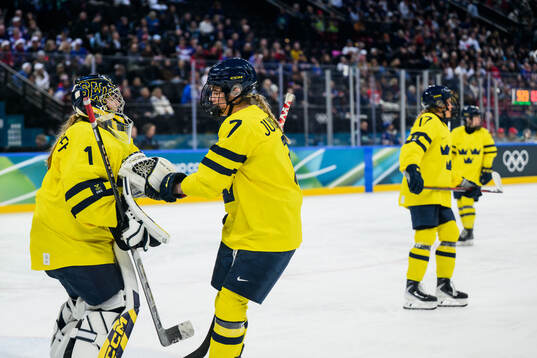 Goaltender Ebba Svensson Träff and Mira Jungåker of
