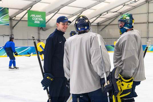 Goalie coach Anthon Hansson with goaltender Filip