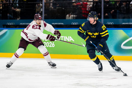 Eduards Tralmaks of Latvia and Rasmus Dahlin of Sweden in