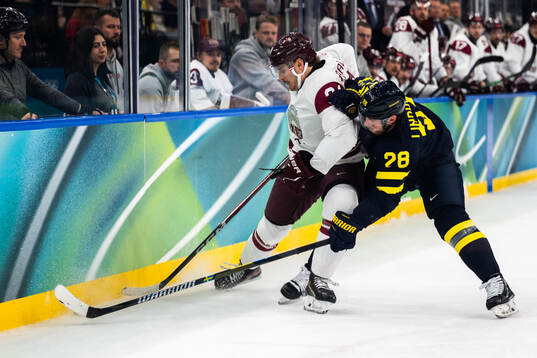 Eduards Tralmaks of Latvia and Elias Lindholm of Sweden in