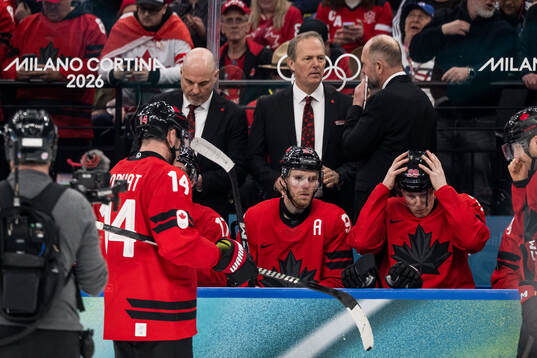Head coach Jon Cooper and Connor McDavid of Canada in the