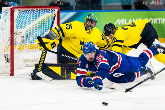 Goaltender Jacob Markström and Rasmus Dahlin of Sweden and