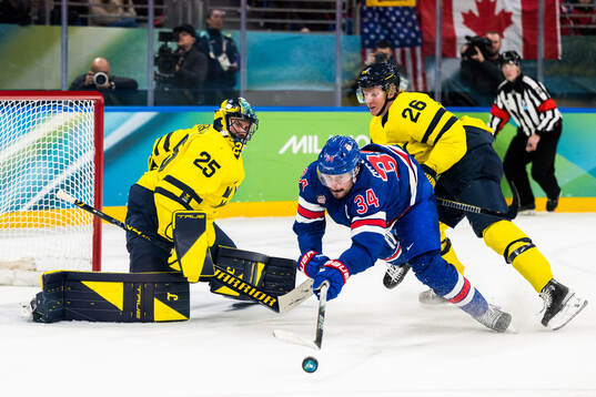 Goaltender Jacob Markström and Rasmus Dahlin of Sweden and