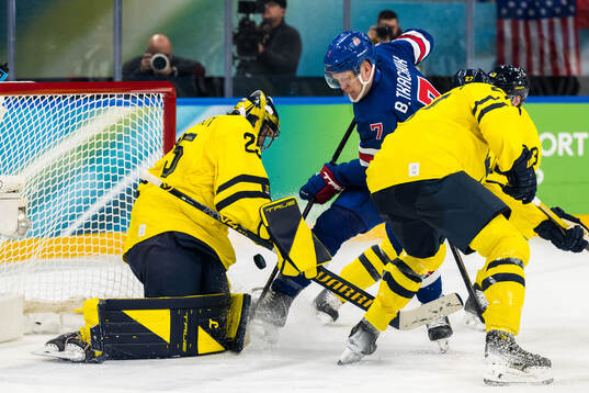 Goaltender Jacob Markström of Sweden and Brady Tkachuk of