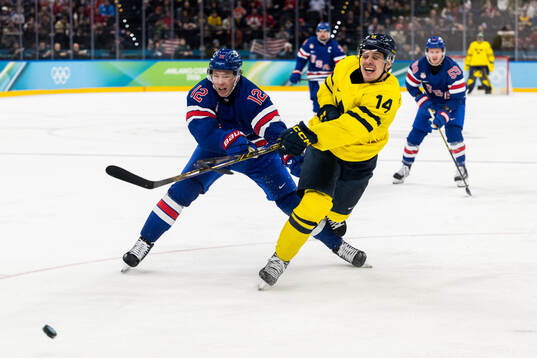 Matt Boldy of USA and Joel Eriksson Ek of Sweden in the