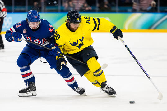 Quinn Hughes of USA and William Nylander of Sweden in the