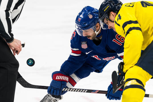Vincent Trocheck of USA and Joel Eriksson Ek of Sweden in
