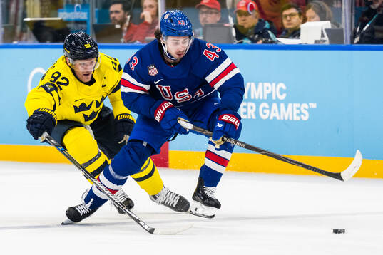 Gabriel Landeskog of Sweden and Quinn Hughes of USA in the
