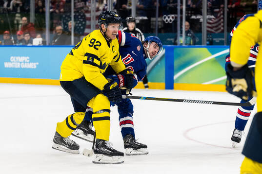 Gabriel Landeskog of Sweden and Quinn Hughes of USA in the
