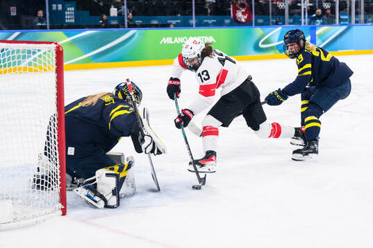 Goaltender Ebba Svensson Träff and Thea Johansson of