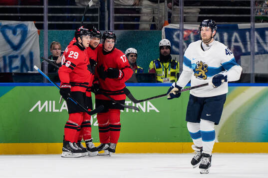 Nathan MacKinnon, Sam Reinhart and Macklin Celebrini of