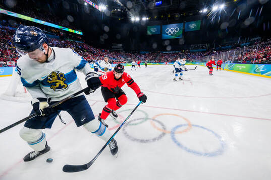 Rasmus Ristolainen of Finland and Nathan MacKinnon of