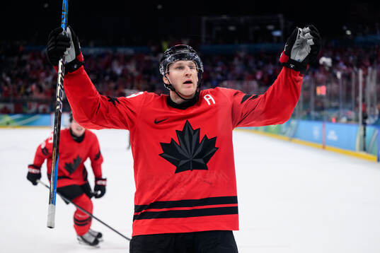 Nathan MacKinnon of Canada celebrates