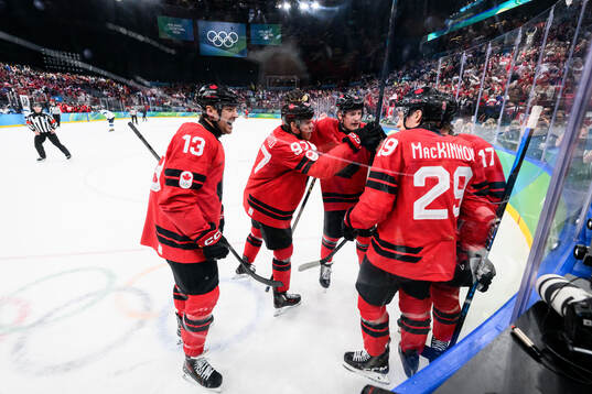 Players of Canada celebrate the 3-2 goal by Nathan
