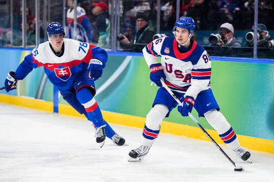 Martin Pospisil of Slovakia and Jack Hughes of USA in the