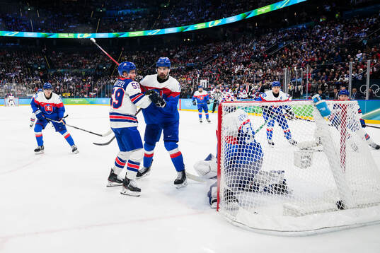 Jake Guentzel of USA against Peter Ceresnak and goaltender