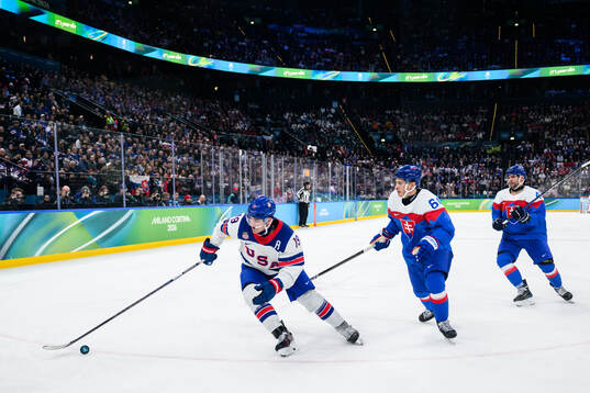 Matthew Tkachuk of USA and Patrik Koch of Slovakia in the