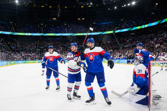 Jake Guentzel of USA with Peter Ceresnak of Slovakia in the