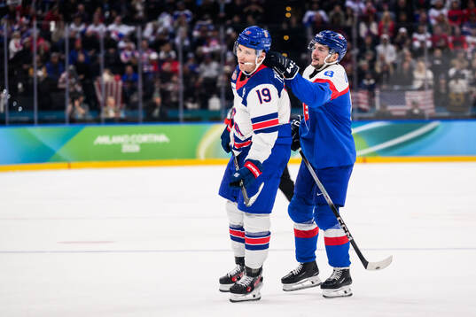 Oliver Okuliar of Slovakia and Matthew Tkachuk of USA in