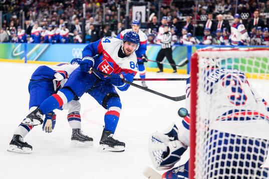 Pavol Regenda of Slovakia scores the 6-2 goal against