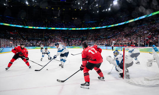 Connor McDavid and Macklin Celebrini of Canada against Esa