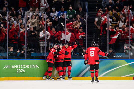 Macklin Celebrini, Nathan MacKinnon, and Cale Makar of