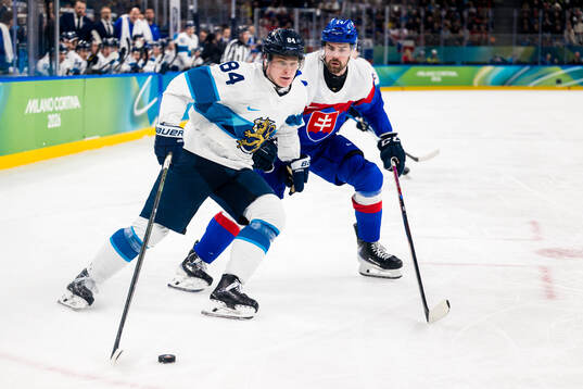 Kaapo Kakko of Finland and Peter Ceresnak of Slovakia in