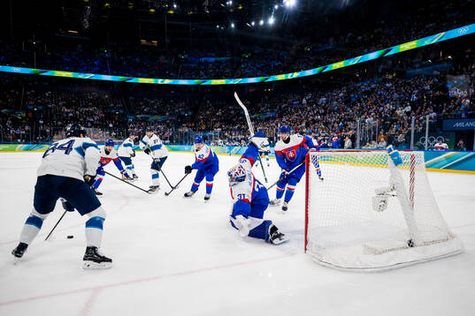 Kaapo Kakko of Finland and goaltender Samuel Hlavaj of