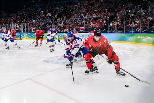 Quinn Hughes of USA and Connor McDavid of Canada in the