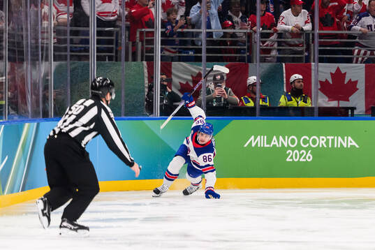Jack Hughes of USA celebrates