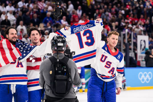 Auston Matthews and Matthew Tkachuk with the shirt of