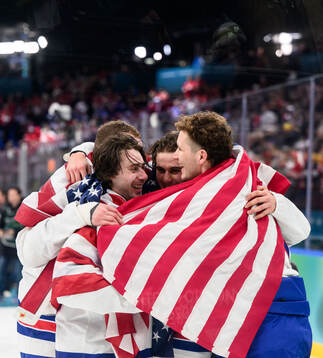 Quinn Hughes, Jack Hughes and Matthew Tkachuk of USA