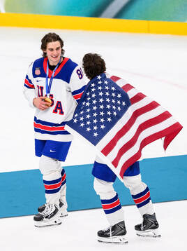 Jack Hughes of USA celebrates