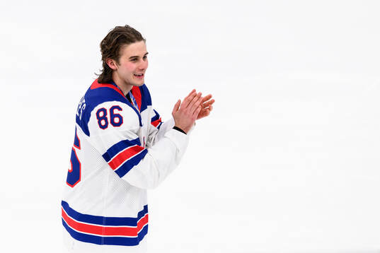 Jack Hughes of USA celebrates