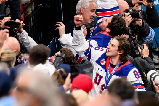 Jack Hughes of USA celebrates