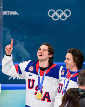 Jack Hughes of USA celebrates