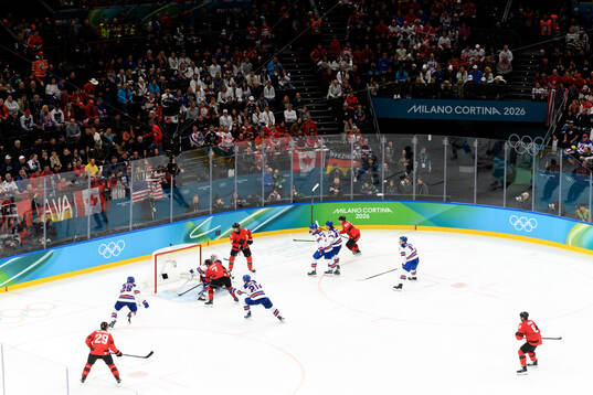 Goaltender Connor Hellebuyck of USA with a save in the