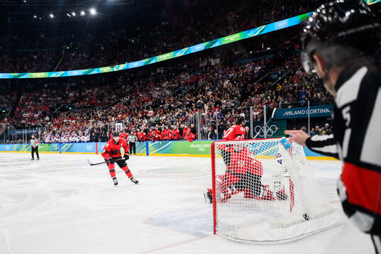 The referee points for goal for the game winning goal in