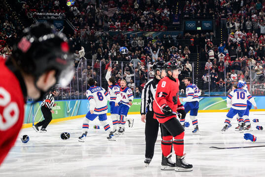 Jack Hughes of USA celebrates
