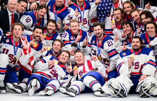 Matthew Tkachuk and Brady Tkachuk of USA celebrate with the