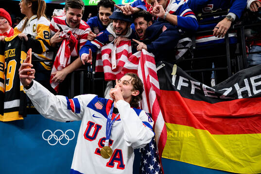 Jack Hughes of USA celebrate with fans