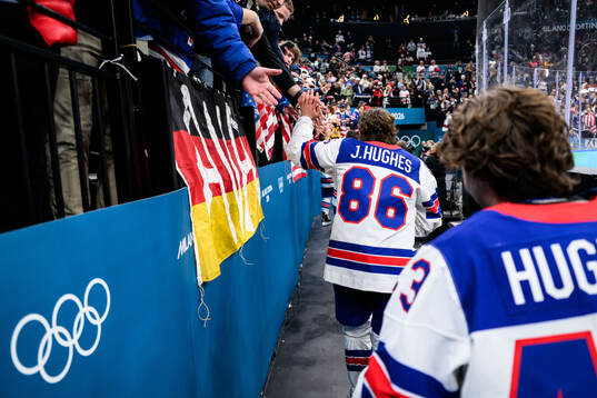 Jack Hughes of USA celebrate with fans