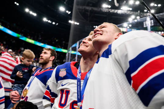 Matthew Tkachuk and Brady Tkachuk of USA celebrate