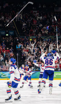 Jack Hughes of USA celebrates